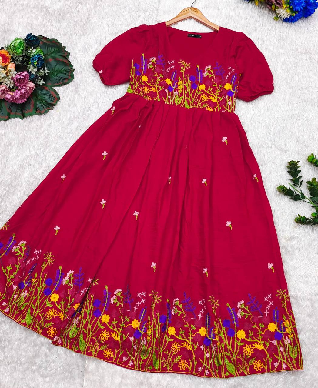 Red Rangbhoomi Floral Embrace dress with chain stitch embroidery detail. Maska cotton, 48-inch length.