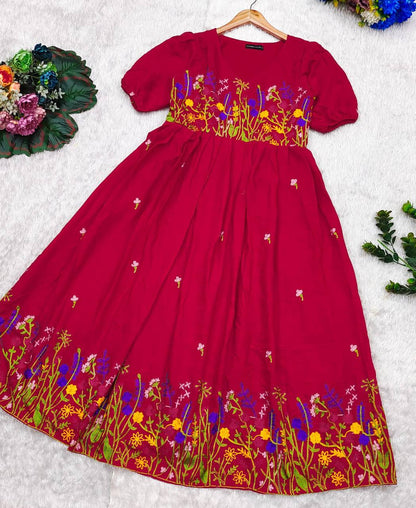 Red Rangbhoomi Floral Embrace dress with chain stitch embroidery detail. Maska cotton, 48-inch length.