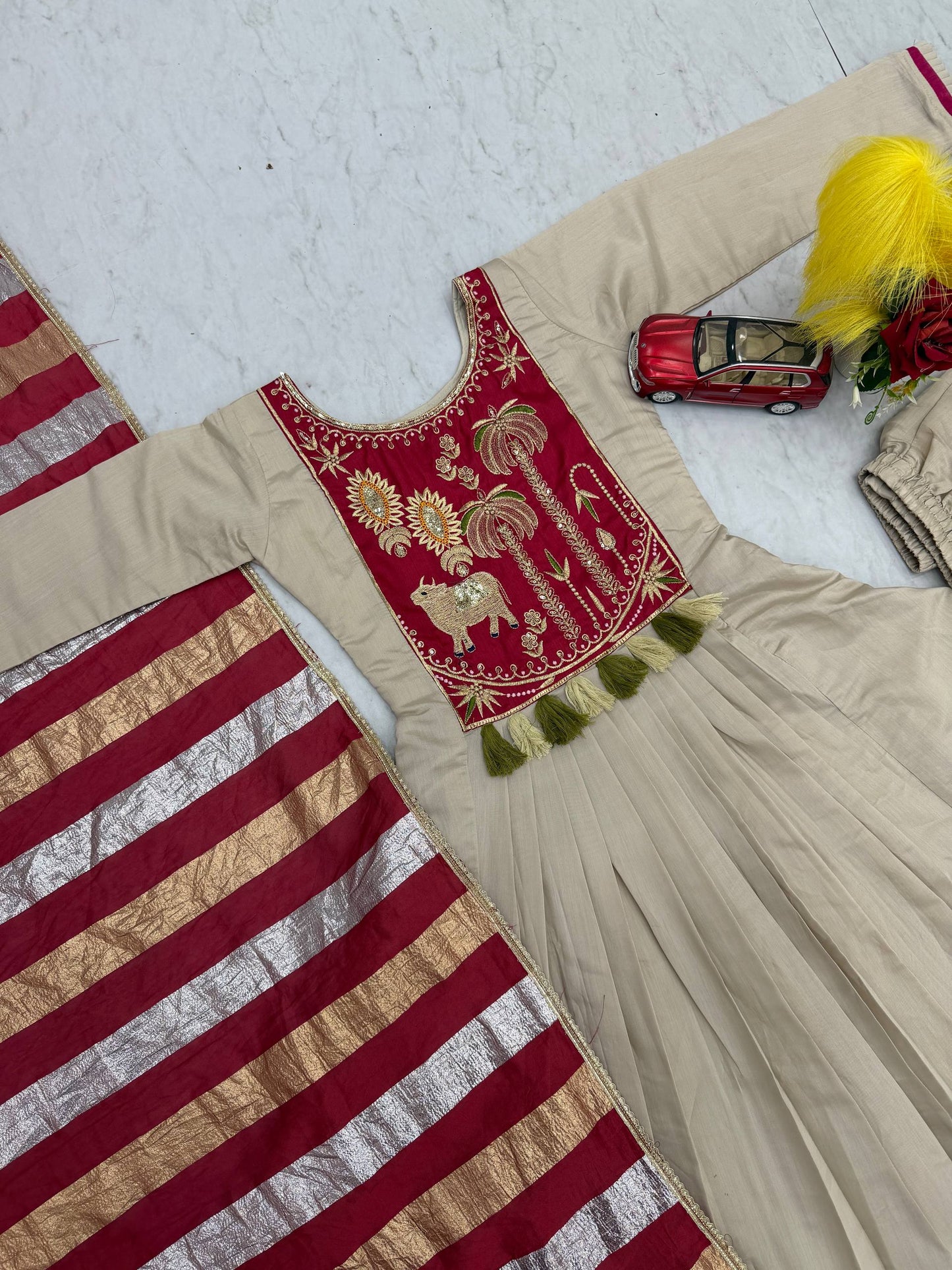 Festival Special Off-White Intricate A-Line Kurti with Flared Pants and Brick Red & Gold Striped Dupatta