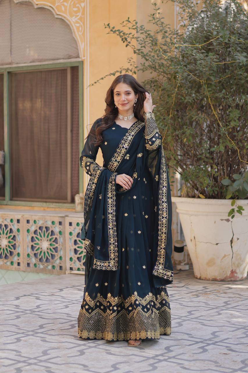 Teal Anarkali suit with a fancy neck design and comfortable full sleeves.