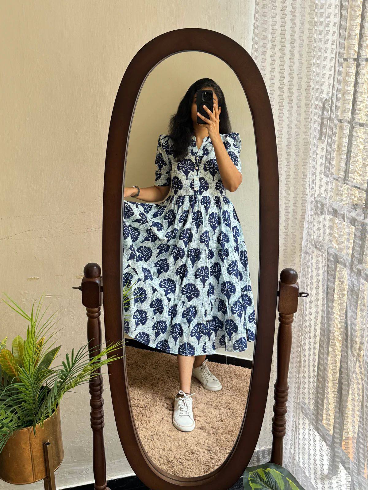 Stylish floral maxi dress in soft cotton with tiered skirt and relaxed fit.