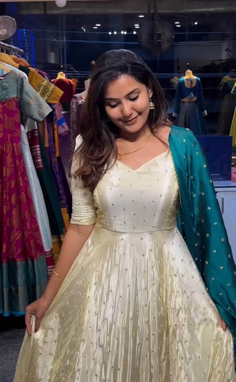 Model wearing Green Victoria Suit Set with embroidered dupatta.